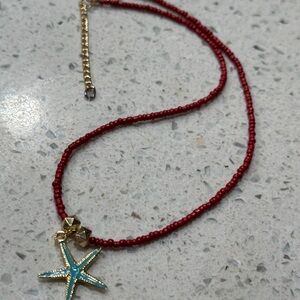 Red Beaded Necklace with Starfish Pendant